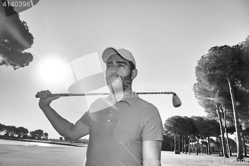 Image of handsome middle eastern golfer