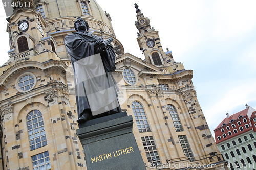 Image of Frauenkirche (Our Lady church) and statue Martin Luther in the c
