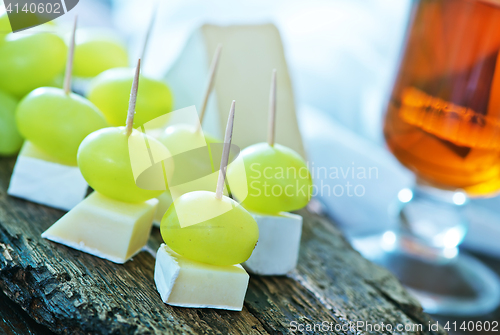 Image of camembert and grape