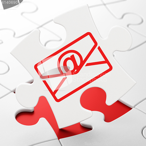 Image of Finance concept: Email on puzzle background