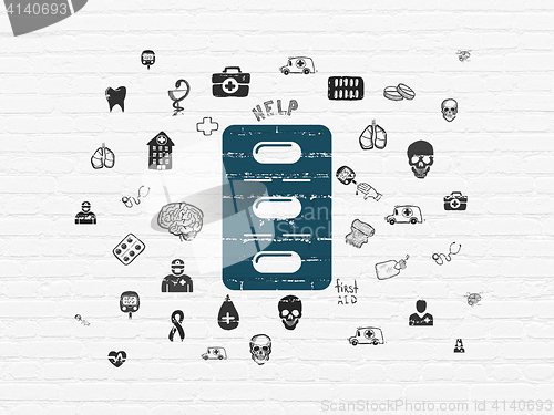 Image of Health concept: Pills Blister on wall background