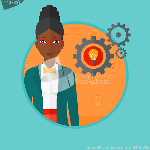 Image of Woman with bulb and gears.