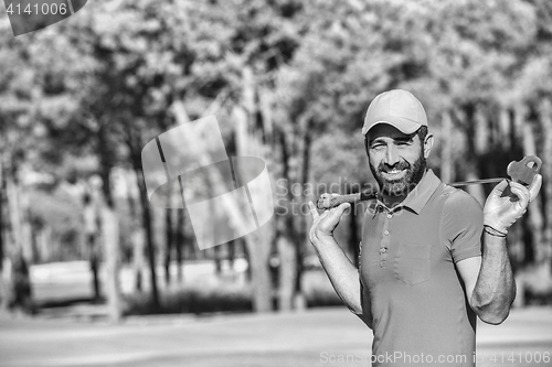 Image of handsome middle eastern golfer