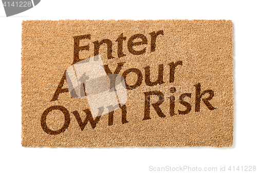 Image of Enter At Your Own Risk Welcome Mat On White