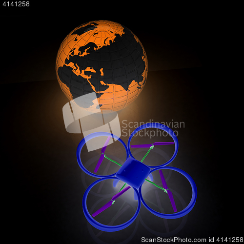 Image of Quadrocopter Drone with Earth Globe and remote controller on a w