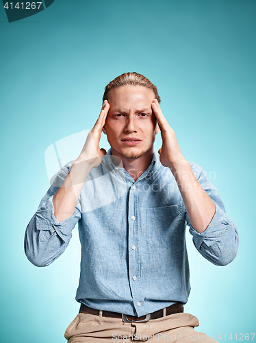 Image of Tired businessman with headache emotions