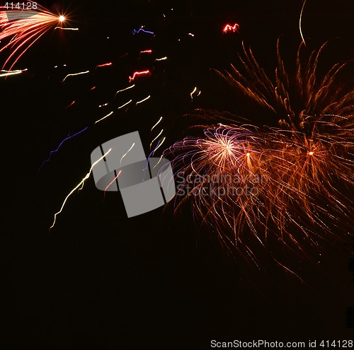 Image of Colorful fireworks on dark sky