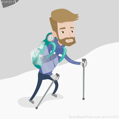 Image of Young mountaneer climbing a snowy ridge.