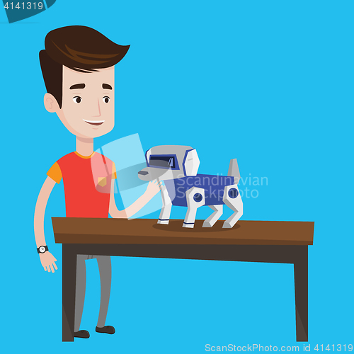 Image of Happy young man playing with robotic dog.