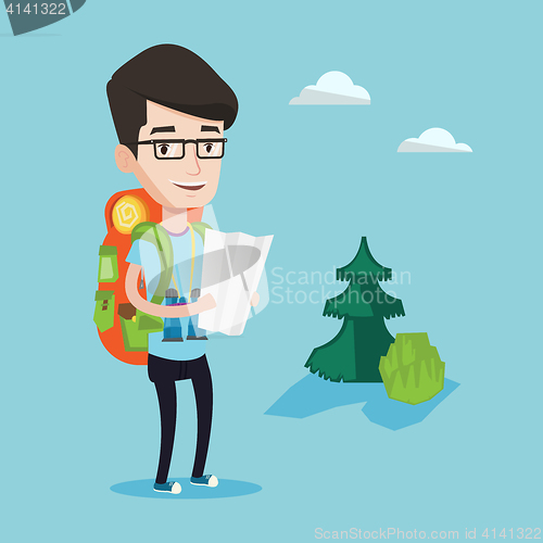 Image of Traveler with backpack looking at map.