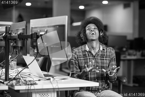 Image of portrait of a young successful African-American woman in modern 