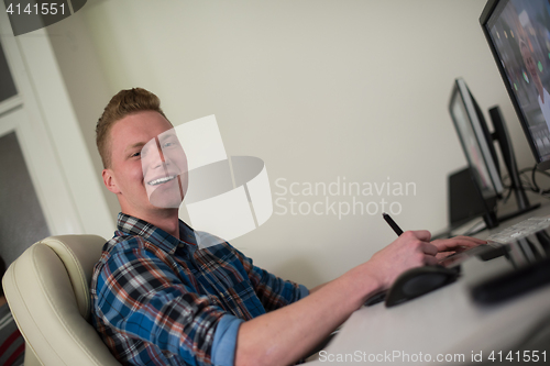 Image of graphic designer at work