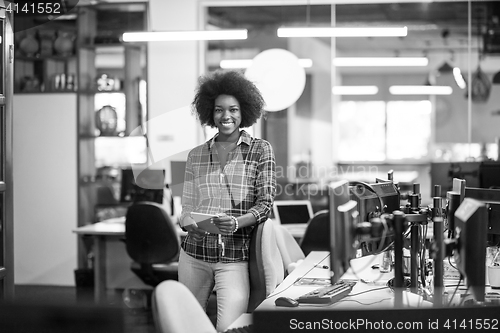 Image of portrait of a young successful African-American woman in modern 