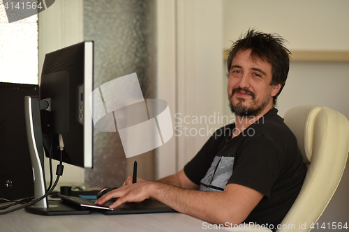 Image of graphic designer in the office