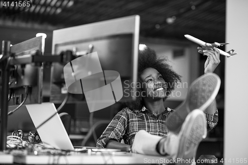 Image of portrait of a young successful African-American woman in modern 