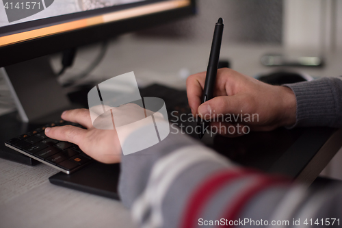 Image of graphic designer at work