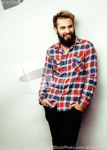 Image of portrait of young bearded hipster guy smiling on white background close up, brutal man, lifestyle people concept