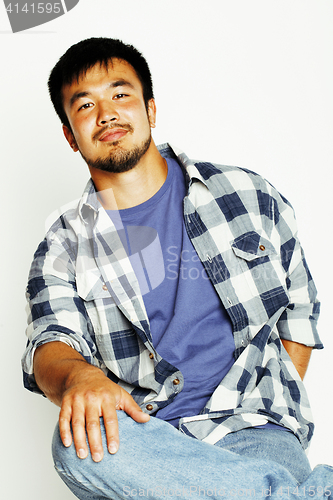 Image of young cute asian man on white background gesturing emotional, po