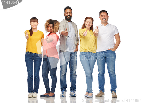 Image of international group of people showing thumbs up