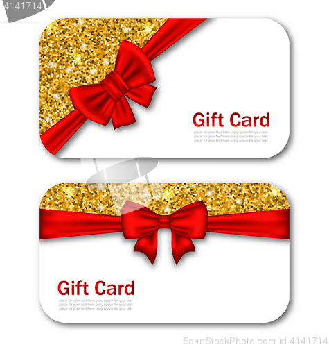 Image of Gift Cards with Red Bow Ribbon and Golden Sparkles