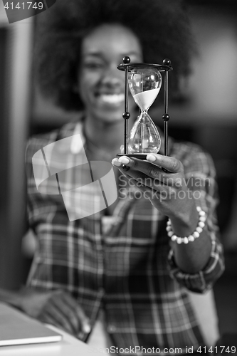 Image of portrait of a young successful African-American woman in modern 