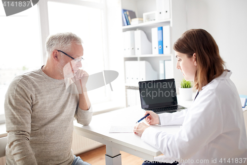Image of old man and doctor with prescription at hospital