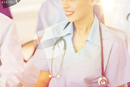 Image of close up of doctor with stethoscope at seminar