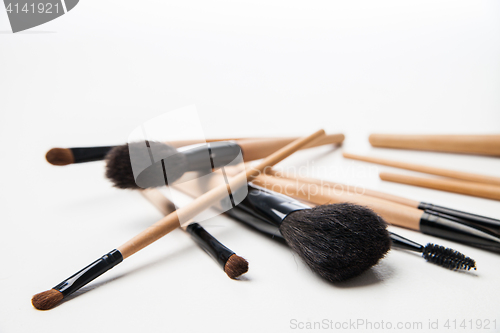 Image of Set of cosmetic brushes on a white background