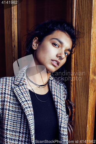 Image of young pretty student teenage indian girl in doors happy smiling, having fun, lifestyle people concept