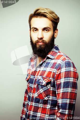 Image of portrait of young bearded hipster guy smiling on white background close up, brutal man, lifestyle people concept