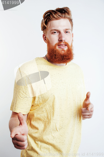 Image of young handsome hipster bearded guy looking brutal isolated on white background, lifestyle people concept