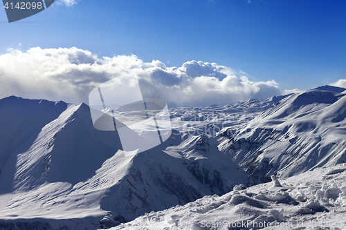 Image of Speed flying in sunny winter mountains