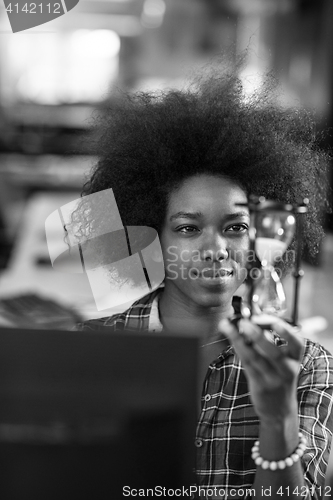 Image of portrait of a young successful African-American woman in modern 