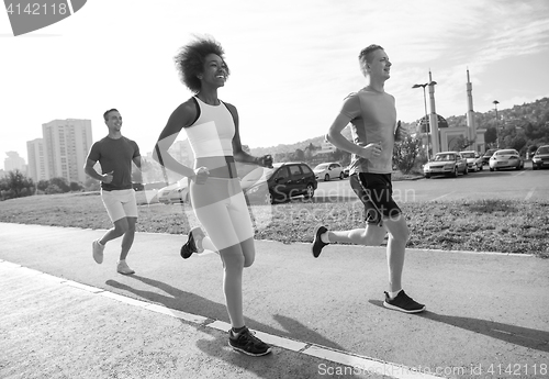 Image of multiethnic group of people on the jogging