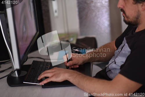 Image of graphic designer at work