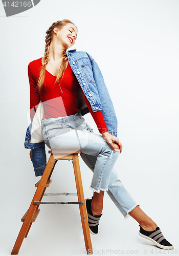 Image of young pretty stylish blond hipster girl posing emotional isolated on white background happy smiling cool smile, lifestyle people concept