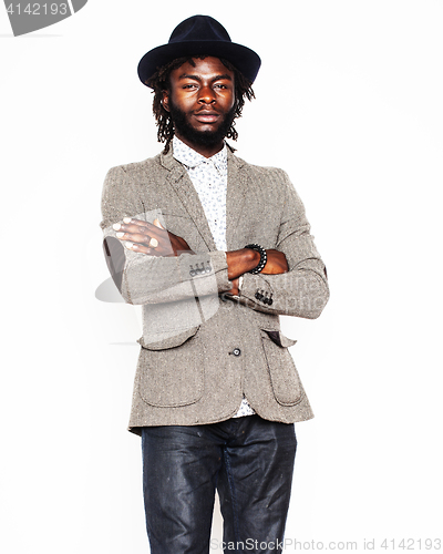 Image of young handsome afro american boy in stylish hipster hat gesturin
