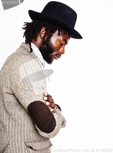 Image of young handsome afro american boy in stylish hipster hat gesturin