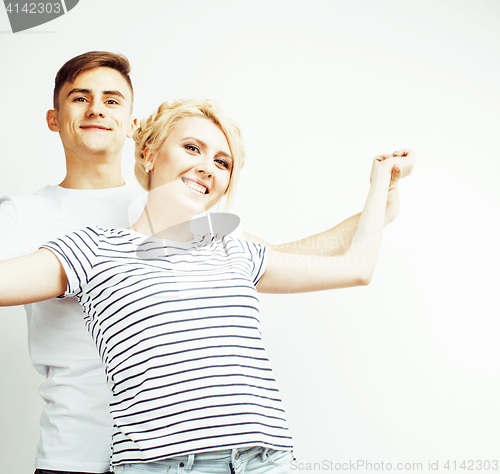 Image of young pretty teenage couple, hipster guy with his girlfriend happy smiling and hugging isolated on white background, lifestyle people concept