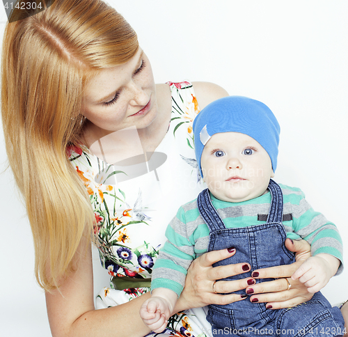 Image of young beauty mother with cute baby, red head happy modern family isolated on white background close up, lifestyle people concept