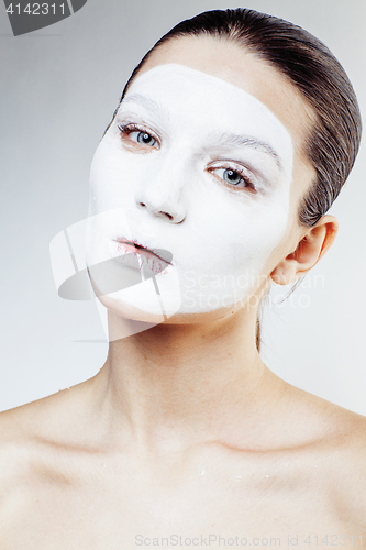 Image of young pretty woman with facial white mask isolated close up spa, lifestyle people healthcare concept