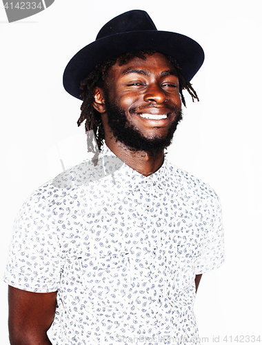 Image of young handsome afro american boy in stylish hipster hat gesturin