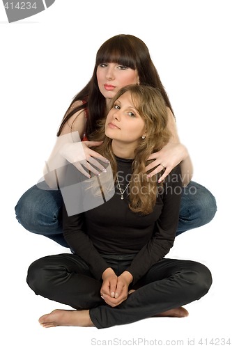 Image of Two beauty young embracing women. Isolated.