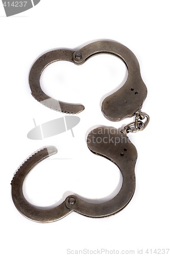 Image of steel handcuffs. isolated on a white background.