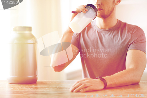 Image of close up of man drinking protein shake