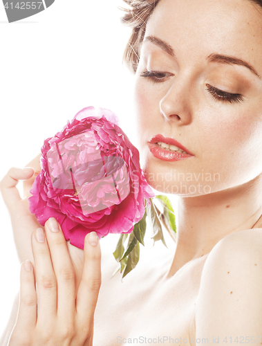 Image of young beauty woman with flower peony pink closeup makeup soft te