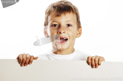 Image of little cute boy holding empty shit to copyspace isolated close u