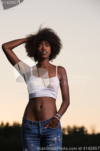 Image of young black woman in nature