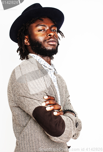 Image of young handsome afro american boy in stylish hipster hat gesturin