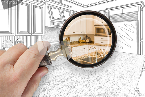 Image of Hand Holding Magnifying Glass Revealing Custom Kitchen Design Dr